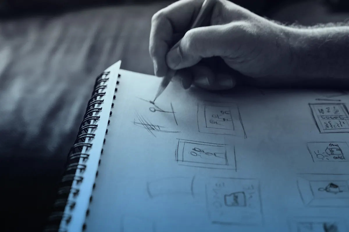 An idea being sketched in a notebook